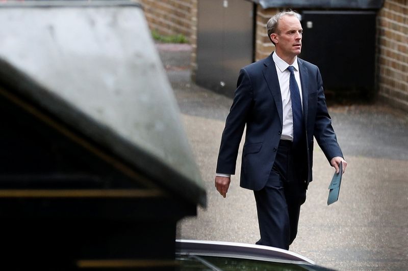 &copy; Reuters. FILE PHOTO; Britain's Foreign Secretary Dominic Raab walks outside the Foreign, Commonwealth and Development Office in London, Britain, August 20, 2021. REUTERS/Peter Nicholls