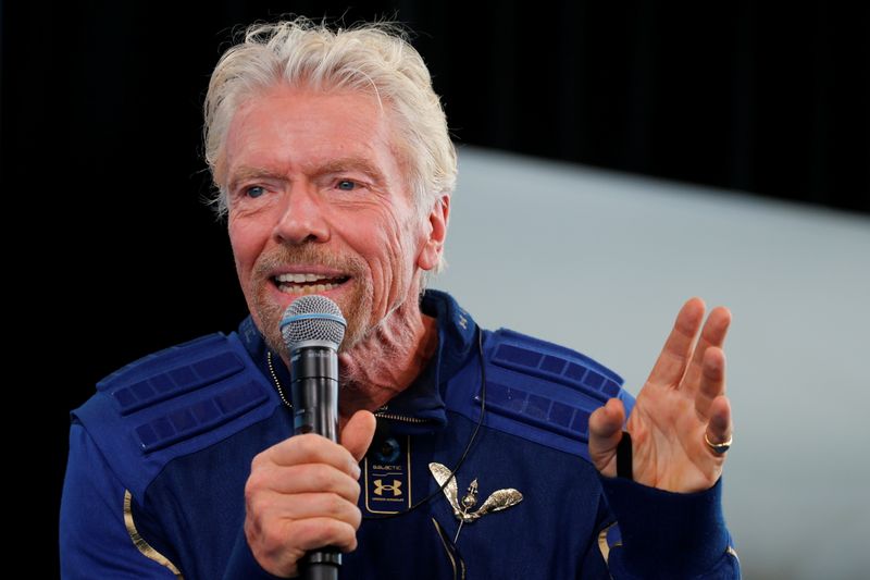 &copy; Reuters. FILE PHOTO: Billionaire entrepreneur Richard Branson wears his astronaut's wings at a news conference, after flying with a crew in Virgin Galactic's passenger rocket plane VSS Unity to the edge of space at Spaceport America near Truth or Consequences, New