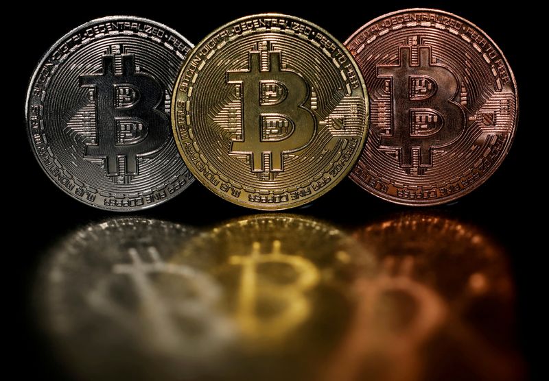 Bitcoin price rises past $50,000 then retreats