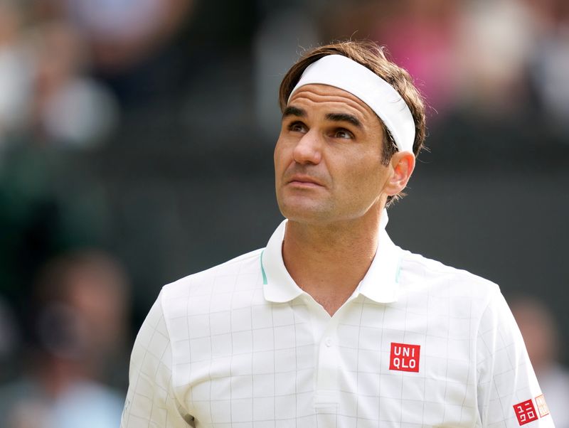 &copy; Reuters. FILE PHOTO: Jul 7, 2021; London, United Kingdom; Roger Federer (SUI) plays against Hubert Hurkacz (POL) in the quarter finals at All England Lawn Tennis and Croquet Club. Mandatory Credit: Peter van den Berg-USA TODAY Sports/File Photo/File Photo