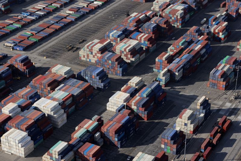 &copy; Reuters. FILE PHOTO: Shipping containers sit on the dock at a container terminal at the Port of Long Beach-Port of Los Angeles complex, amid the coronavirus disease (COVID-19) pandemic, in Los Angeles, California, U.S., April 7, 2021. REUTERS/Lucy Nicholson/File P