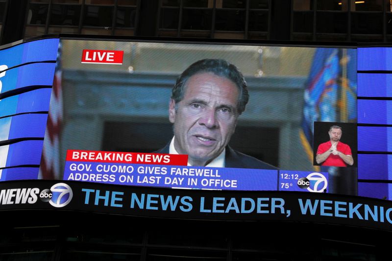 &copy; Reuters. A farewell speech by New York Governor Andrew Cuomo is broadcast live on a screen in Times Square on his final day in office in Manhattan, New York City, U.S., August 23, 2021. REUTERS/Andrew Kelly