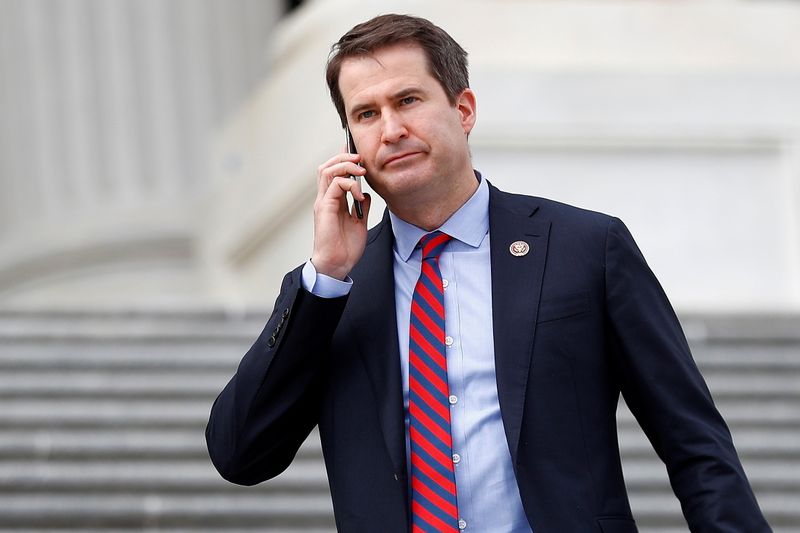 &copy; Reuters. FILE PHOTO: Rep. Seth Moulton (D-MA) descends down the House entrance stairs following the Friends of Ireland reception on Capitol Hill in Washington, U.S., March 12, 2020. REUTERS/Tom Brenner/File Photo