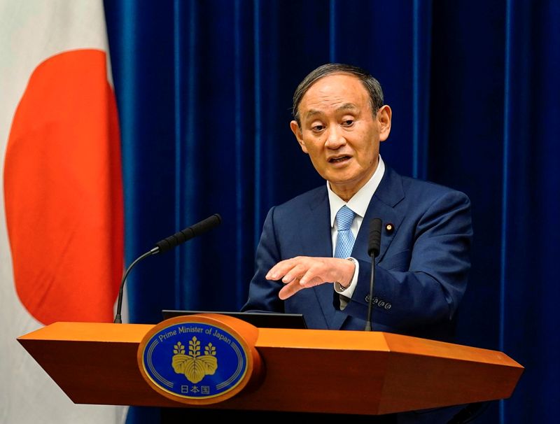 © Reuters. Primeiro-ministro do Japão, Yoshihide Suga, durante coletiva de imprensa em Tóquio, Japão 
17/08/2021 Kimimasa Mayama/Pool via REUTERS