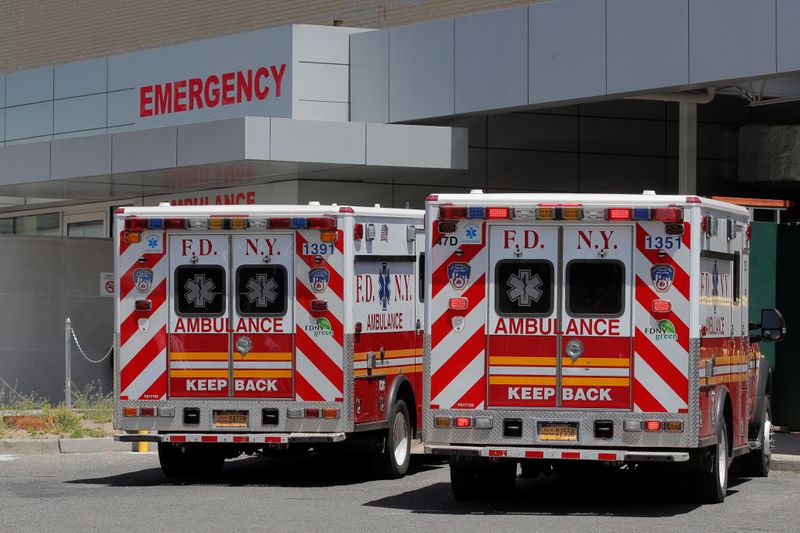 &copy; Reuters. New York City Fire Department (FDNY) Ambulances are parked at the emergency entrance of St. John's Episcopal Hospital, during the outbreak of the coronavirus disease (COVID-19), in the Far Rockaway section of Queens in New York City, U.S., May 20, 2020. R