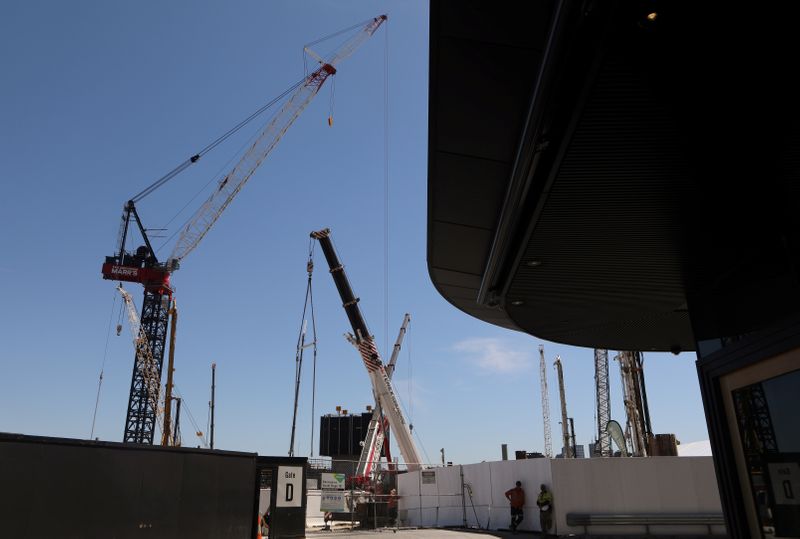 &copy; Reuters. FILE PHOTO: Construction cranes are seen at a construction site in central Sydney, Australia, February 8, 2018. REUTERS/Daniel Munoz