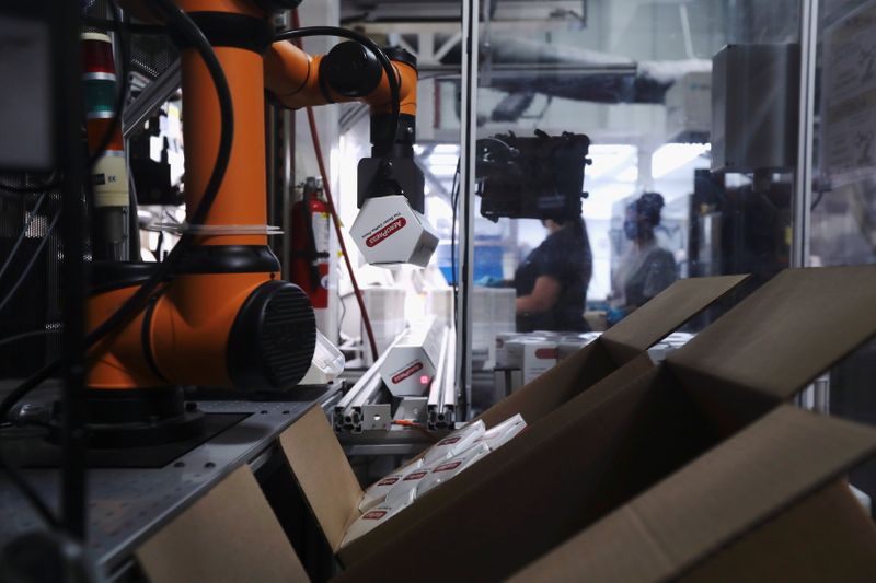 &copy; Reuters. A Rapid Robotics robot moves products inside a Westec Plastics Corp warehouse in Livermore, California, U.S. on August 19, 2021. Picture taken August 19, 2021. REUTERS/Nathan Frandino