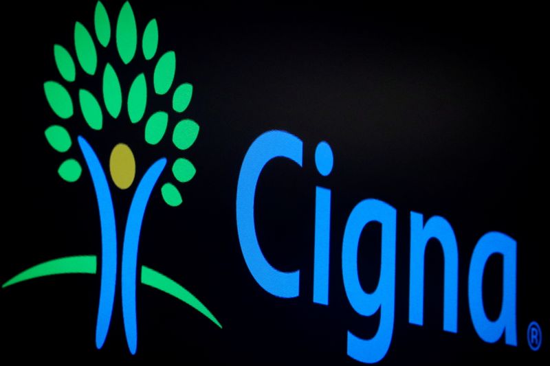 &copy; Reuters. FILE PHOTO: A screen displays the logo for Cigna Corp on the floor at the New York Stock Exchange (NYSE) in New York, U.S., July 16, 2019. REUTERS/Brendan McDermid/File Photo