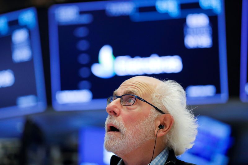 &copy; Reuters. A trader works on the floor at the New York Stock Exchange (NYSE) in Manhattan, New York City, U.S., August 20, 2021. REUTERS/Andrew Kelly