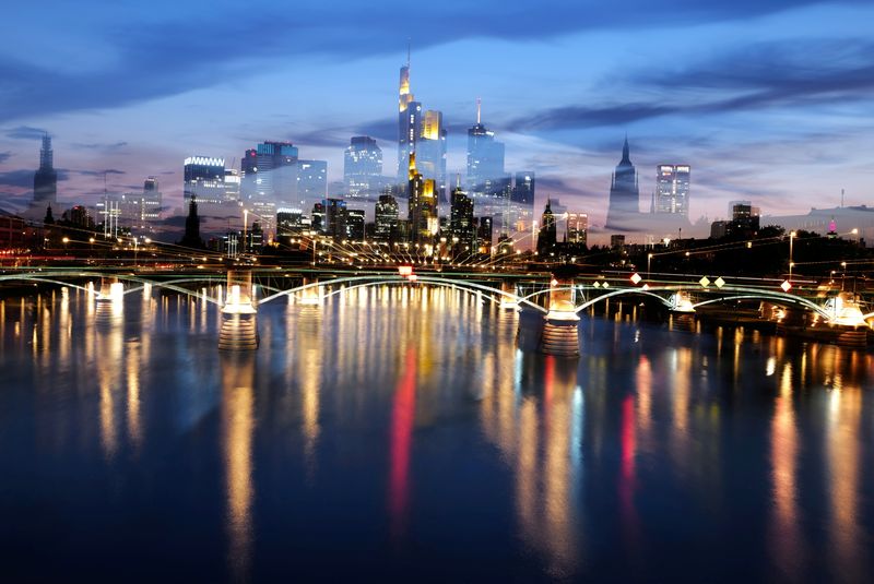 &copy; Reuters. FILE PHOTO: The skyline with the banking district is photographed in Frankfurt, Germany, August 24, 2021. Picture is taken with long time exposure and zoom burst.  REUTERS/Kai Pfaffenbach/File Photo