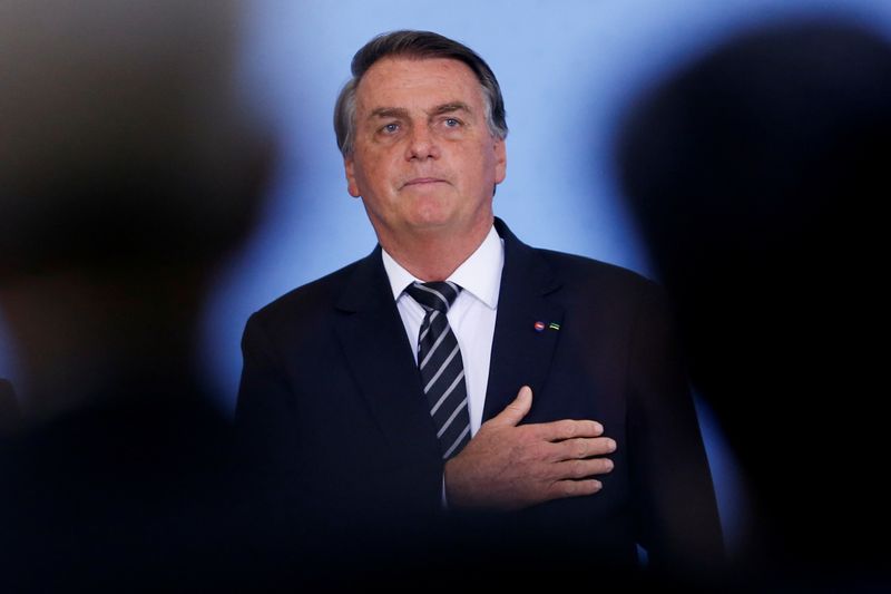 &copy; Reuters. FILE PHOTO: Brazil's President Jair Bolsonaro attends the ceremony of National Volunteer Day at the Planalto Palace in Brasilia, Brazil August 26, 2021. REUTERS/Adriano Machado