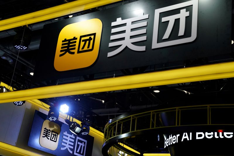 &copy; Reuters. FILE PHOTO: Signs of Meituan are seen at its booth at the 2020 China International Fair for Trade in Services (CIFTIS) in Beijing, China, Sept. 4, 2020. REUTERS/Tingshu Wang