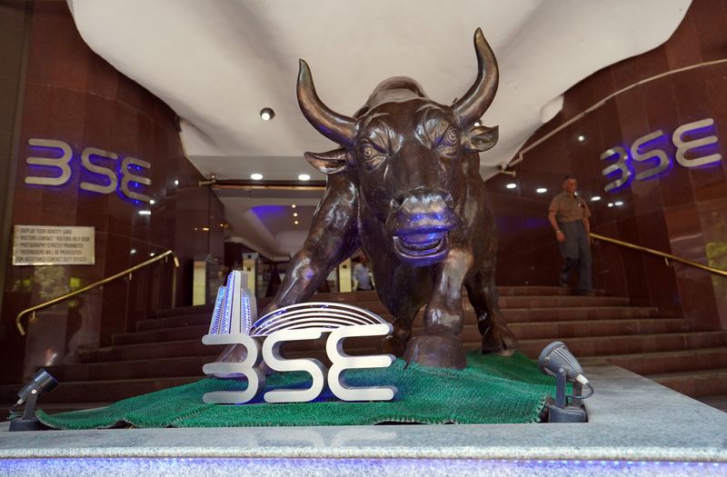 &copy; Reuters. FILE PHOTO: A man walks out of the Bombay Stock Exchange (BSE) building in Mumbai, India, February 28, 2020. REUTERS/Hemanshi Kamani