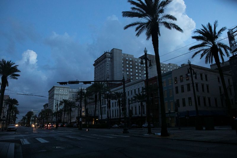 &copy; Reuters. A view of downtown New Orleans at dawn during a blackout in the city after Hurricane Ida made landfall in Louisiana, U.S. August 31, 2021. REUTERS/Marco Bello