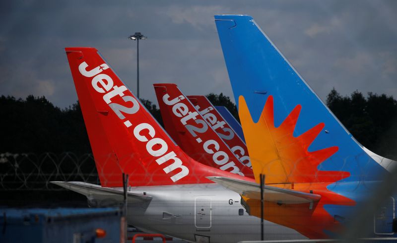 &copy; Reuters. The tails of Jet 2 aircraft are seen as they remain grounded as the spread of the coronavirus disease (COVID-19) continues at Manchester Airport in Manchester, Britain June 20, 2020. Picture taken June 20, 2020. REUTERS/Phil Noble