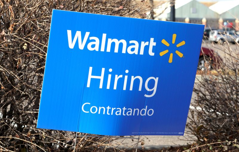 &copy; Reuters. FILE PHOTO: A sign seeking workers is seen at a Walmart store in Westminster, Colorado, U.S., December 6, 2016.  REUTERS/Rick Wilking