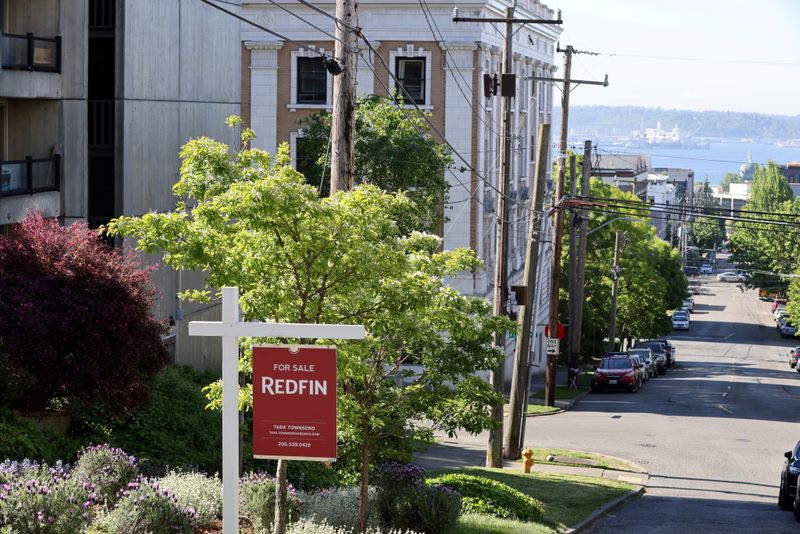 &copy; Reuters. FILE PHOTO: A "For Sale" sign is posted outside a residential home in the Queen Anne neighborhood of Seattle, Washington, U.S. May 14, 2021.   REUTERS/Karen Ducey/File Photo