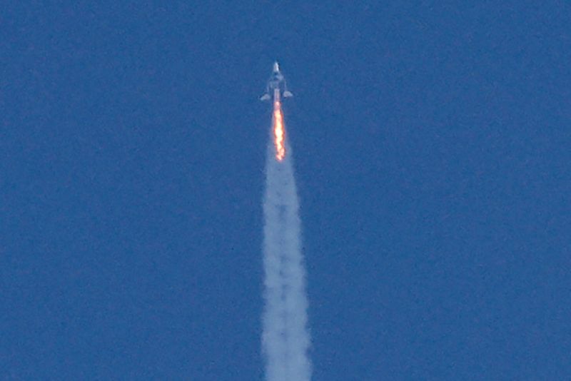 &copy; Reuters. FILE PHOTO: Virgin Galactic's passenger rocket plane VSS Unity, carrying billionaire entrepreneur Richard Branson and his crew, begins its ascent to the edge of space above Spaceport America near Truth or Consequences, New Mexico, U.S., July 11, 2021. REU