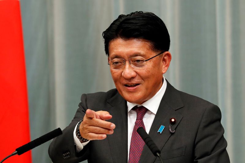 &copy; Reuters. FILE PHOTO: Japan's Minister in charge of digital reform, social security and tax number system Takuya Hirai attends a news conference in Tokyo, Japan, September 16, 2020. REUTERS/Kim Kyung-Hoon