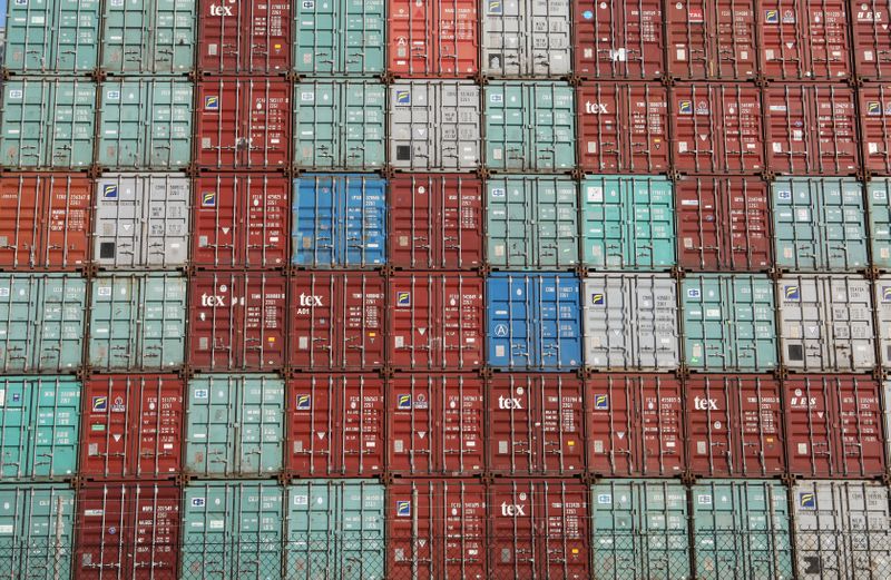 &copy; Reuters. FILE PHOTO: Containers are piled up at Port Botany facilities in Sydney Australia, February 6, 2018. Picture taken February 6, 2018. REUTERS/Daniel Munoz