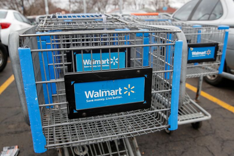 &copy; Reuters. FILE PHOTO: Walmart shopping carts are seen on the parking lot ahead of the Thanksgiving holiday in Chicago, Illinois, U.S. November 27, 2019. REUTERS/Kamil Krzaczynski/File Photo