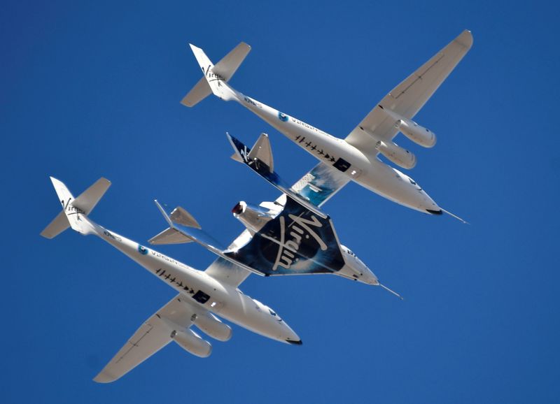 © Reuters. FILE PHOTO: Virgin Galactic rocket plane, the WhiteKnightTwo carrier airplane, with SpaceShipTwo passenger craft takes off from Mojave Air and Space Port in Mojave, California, U.S., February 22, 2019.  REUTERS/Gene Blevins/File Photo