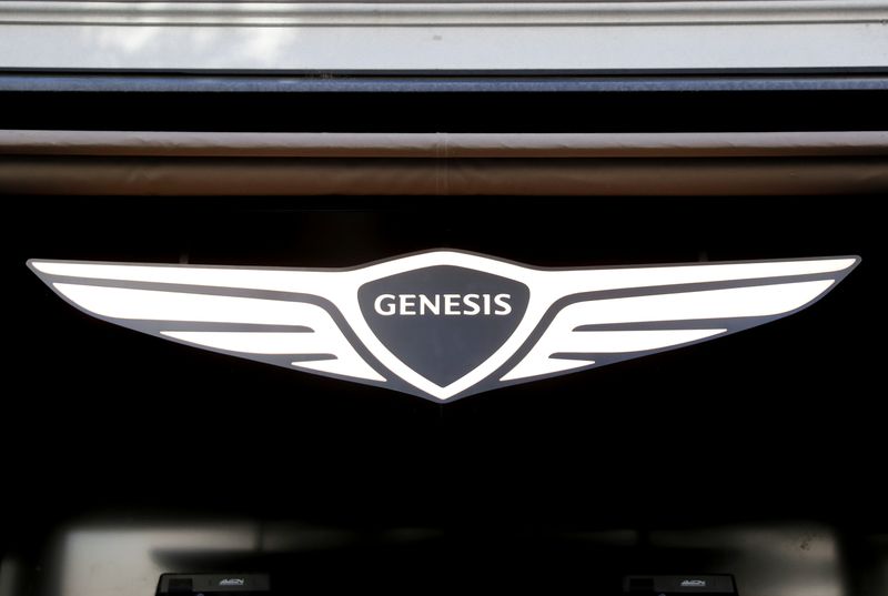 &copy; Reuters. The logo of South Korean car manufacturer Hyundai's premium brand Genesis is seen at a showroom in Zurich, Switzerland May 31, 2021. REUTERS/Arnd Wiegmann