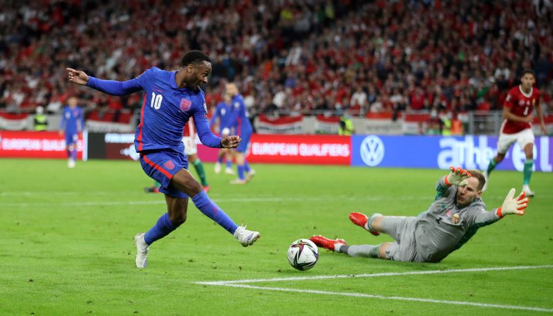 &copy; Reuters. Soccer Football - World Cup - UEFA Qualifiers - Group I - Hungary v England - Puskas Arena, Budapest, Hungary - September 2, 2021 England's Raheem Sterling shoots at goal as Hungary's Peter Gulacsi attempts to save REUTERS/Carl Recine