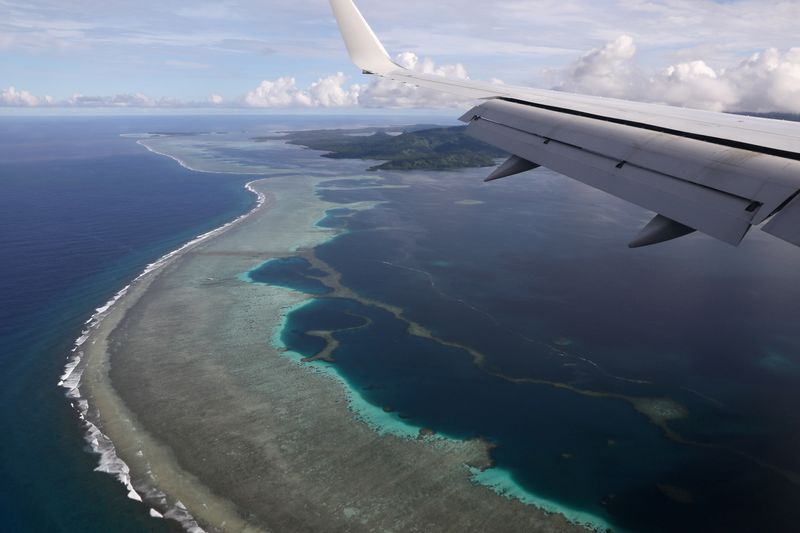 &copy; Reuters. FILE PHOTO: FILE PHOTO: U.S. Secretary of State Mike Pompeo's plane makes its landing approach on Pohnpei International Airport in Kolonia, Federated States of Micronesia August 5, 2019. REUTERS/Jonathan Ernst/File Photo/File Photo