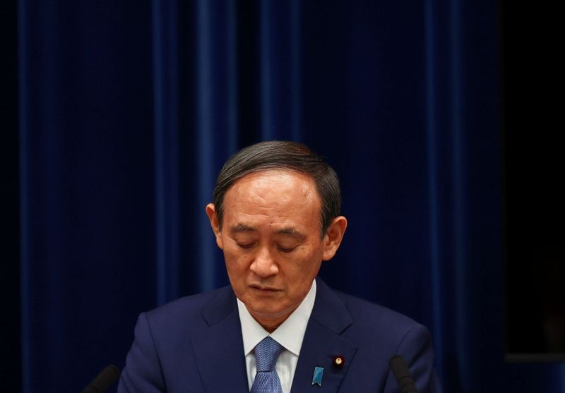 &copy; Reuters. Primeiro-ministro do Japão, Yoshihide Suga, duante entrevista coletiva em Tóquio
30/07/2021 REUTERS/Issei Kato/Pool