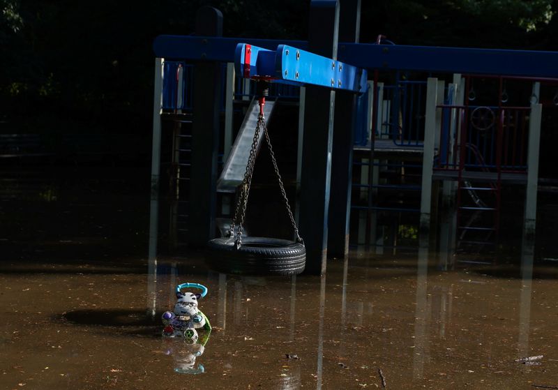 &copy; Reuters. FILE PHOTO: Flooded playground equipment is seen at a park after the remnants of Tropical Storm Ida brought drenching rain and the threat of flash floods and tornadoes to parts of the northern mid-Atlantic, in the Brooklyn borough of New York City, U.S., 