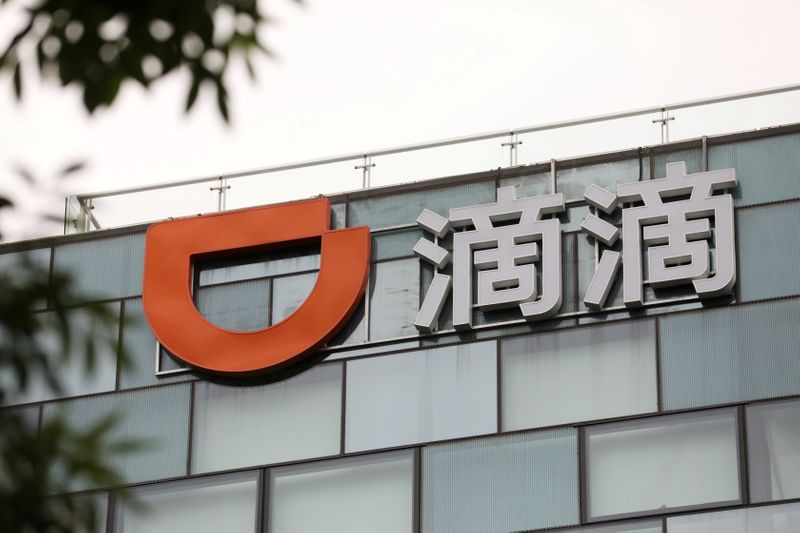 &copy; Reuters. FILE PHOTO: A sign of Chinese ride-hailing service Didi is seen on its headquarters in Beijing, China July 5, 2021. REUTERS/Tingshu Wang/File Photo