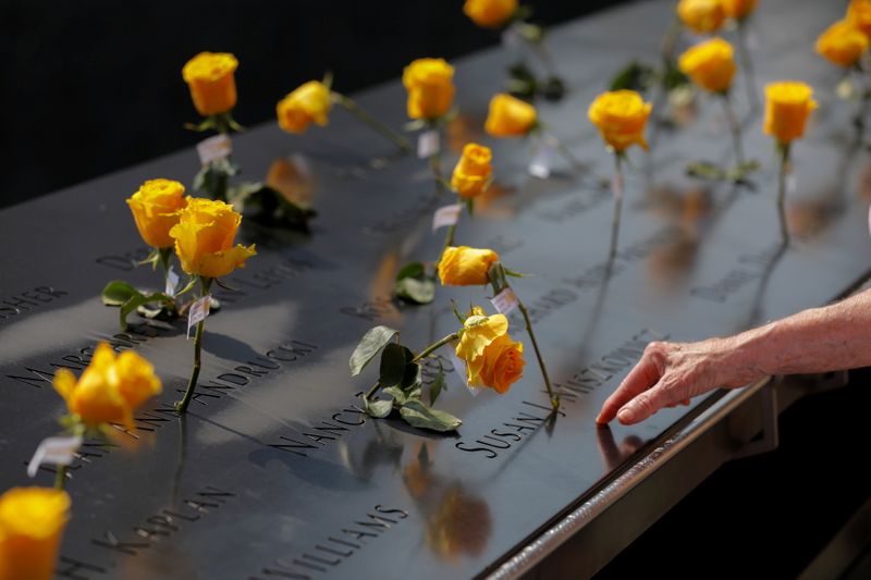 &copy; Reuters. FILE PHOTO: Flowers are seen in the names of victims at the National September 11 Memorial & Museum a month before the 20th anniversary of the September 11 attacks in Manhattan, New York City, U.S., August 11, 2021. REUTERS/Andrew Kelly