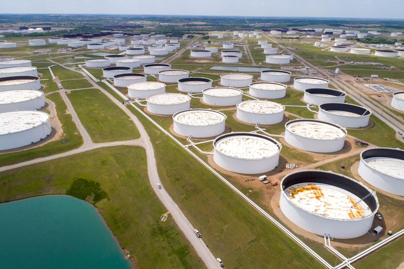 &copy; Reuters. FILE PHOTO: Crude oil storage tanks are seen in an aerial photograph at the Cushing oil hub in Cushing, Oklahoma, U.S. April 21, 2020. REUTERS/Drone Base//File Photo