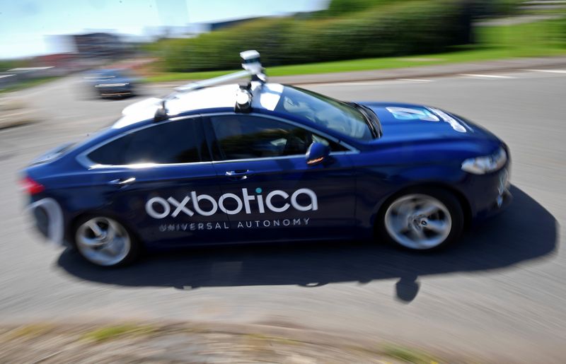 &copy; Reuters. FILE PHOTO: A passenger vehicle is seen traveling autonomously using Oxbotica software during a trial on public roads in Oxford, Britain, June 27, 2019.  REUTERS/Toby Melville