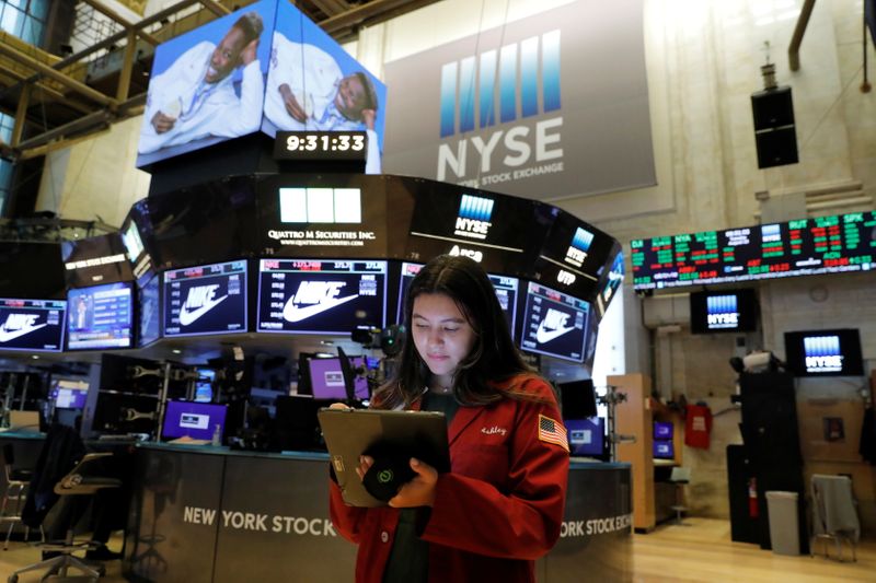 &copy; Reuters. A trader works on the trading floor at the New York Stock Exchange (NYSE) in Manhattan, New York City, U.S., August 10, 2021. REUTERS/Andrew Kelly