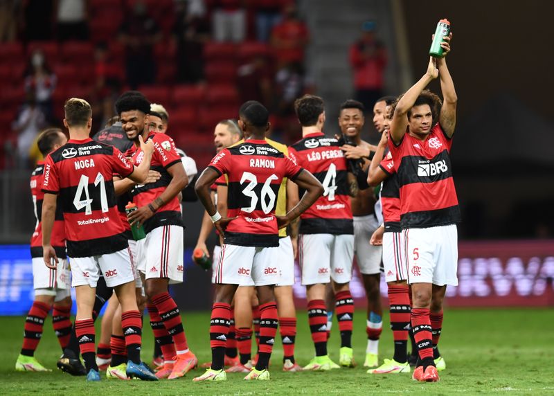 &copy; Reuters. Jogadores do Flamengo comemoram vitória sobre o Olimpia pela Copa Libertadores em Brasília
18/08/2021 REUTERS/Evaristo Sa