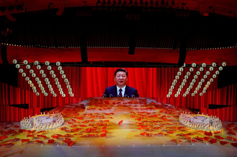 &copy; Reuters. FILE PHOTO: A screen shows Chinese President Xi Jinping during a show commemorating the 100th anniversary of the founding of the Communist Party of China at the National Stadium in Beijing, China June 28, 2021. REUTERS/Thomas Peter