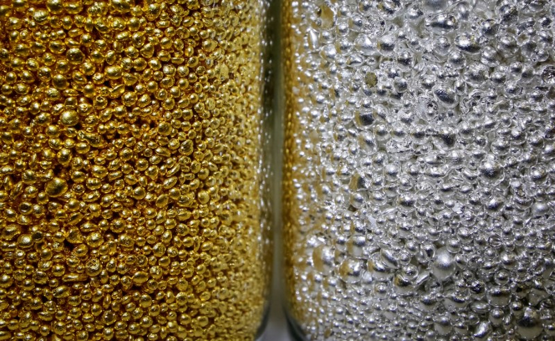 &copy; Reuters. FILE PHOTO: Granules of 99.99 percent pure gold and silver are seen in glass jars at the Krastsvetmet non-ferrous metals plant, one of the world's largest producers in the precious metals industry, in the Siberian city of Krasnoyarsk, Russia November 22, 