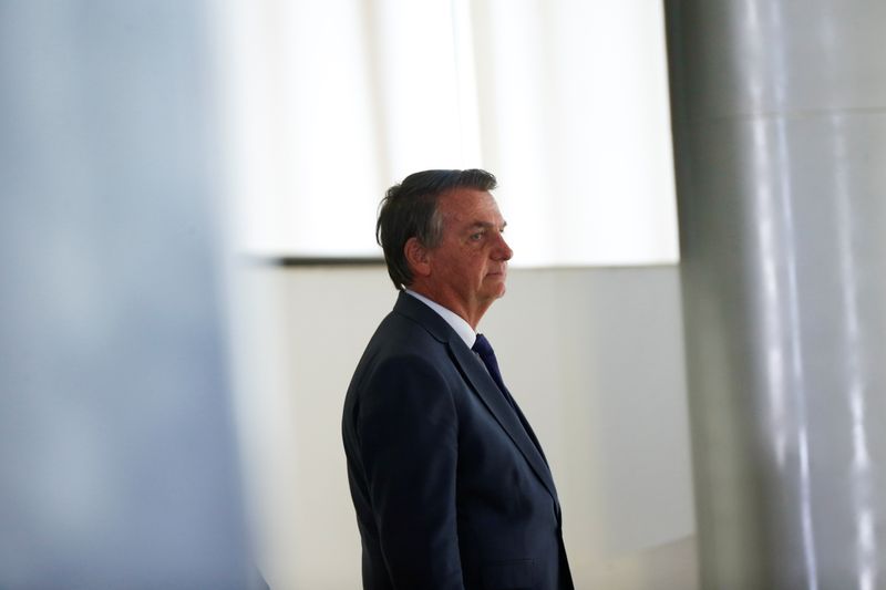 &copy; Reuters. FILE PHOTO: Brazil's President Jair Bolsonaro walks before a ceremony at the Planalto Palace in Brasilia, Brazil September 2, 2021. REUTERS/Adriano Machado