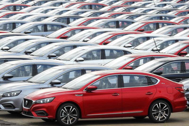&copy; Reuters. FILE PHOTO: Cars for export wait to be loaded onto cargo vessels at a port in Lianyungang, Jiangsu province, China October 14, 2019. REUTERS/Stringer  