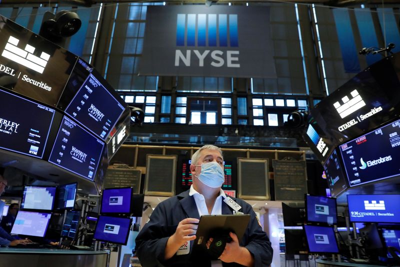 &copy; Reuters. FILE PHOTO: A trader works on the floor at the New York Stock Exchange (NYSE) in Manhattan, New York City, U.S., August 20, 2021. REUTERS/Andrew Kelly