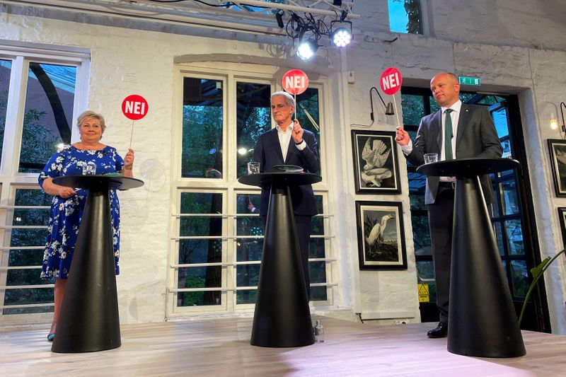 &copy; Reuters. FILE PHOTO: The three candidates for Norway's prime minister Erna Solberg from the Conservatives, Jonas Gahr Stoere from Labour Party and Trygve Slagsvold Vedum from the Centre Party attend a debate in central Oslo, Norway August 9, 2021. Picture taken Au