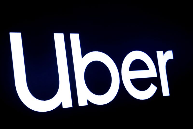 &copy; Reuters. FILE PHOTO: A screen displays the company logo for Uber Technologies Inc at the New York Stock Exchange (NYSE) in New York, U.S., May 10, 2019. REUTERS/Brendan McDermid/File Photo