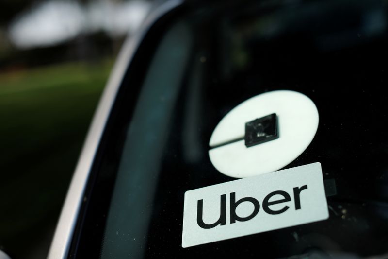 &copy; Reuters. FILE PHOTO: An Uber logo is shown on a rideshare vehicle during a statewide day of action to demand that ride-hailing companies Uber and Lyft follow California law and grant drivers "basic employee rights'', in Los Angeles, California, U.S., August 20, 20