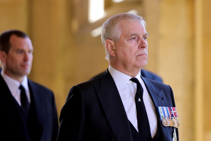 &copy; Reuters. FILE PHOTO: Britain's Britain's Prince Andrew, Duke of York, looks on during the funeral of Britain's Prince Philip, husband of Queen Elizabeth, who died at the age of 99, on the grounds of Windsor Castle in Windsor, Britain, April 17, 2021. Chris Jackson