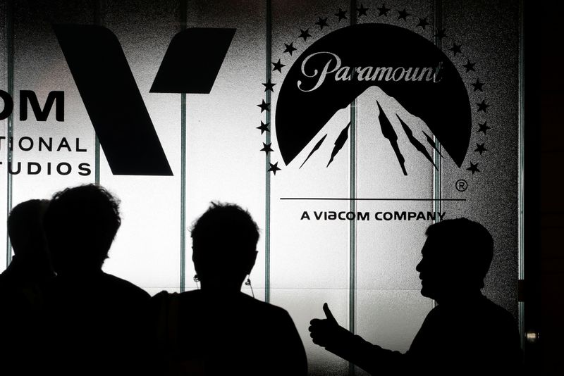 &copy; Reuters. FILE PHOTO: Visitors are silhouetted at the Paramount Pictures stand during the annual MIPCOM television programme market in Cannes, France, October 15, 2018. REUTERS/Eric Gaillard