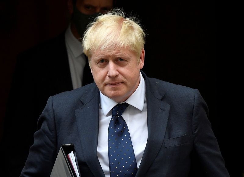 &copy; Reuters. بوريس جونسون رئيس وزراء بريطانيا يغادر مقر الحكومة في لندن يوم السادس من سبتمبر أيلول 2021. تصوير: توبي ميلفيل - رويترز.