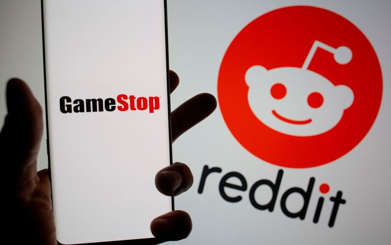 &copy; Reuters. FILE PHOTO: GameStop logo is seen in front of displayed Reddit logo in this illustration taken on Febr. 2, 2021. REUTERS/Dado Ruvic/Illustration/File Photo