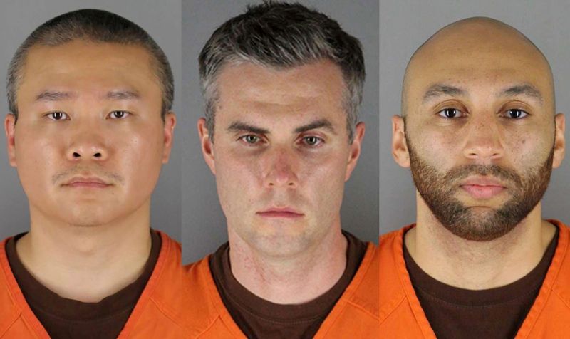 &copy; Reuters. FILE PHOTO: (L-R) Former Minneapolis police officers Tou Thao, Thomas Lane and J. Alexander Kueng in a combination of booking photographs from the Minnesota Department of Corrections and Hennepin County Jail in Minneapolis, Minnesota.  U.S. Minnesota Depa